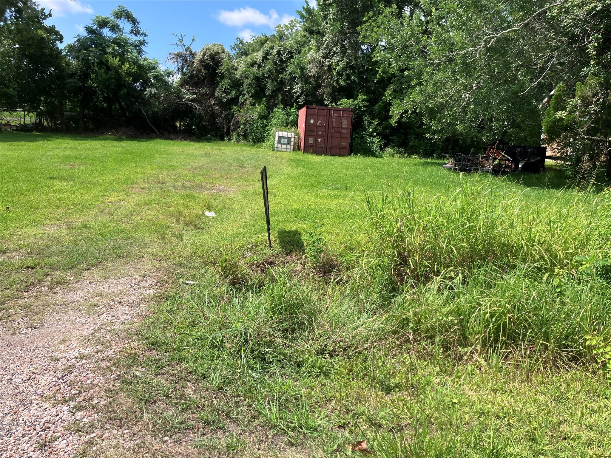Image 1: Front of lot.  Storage container will be removed