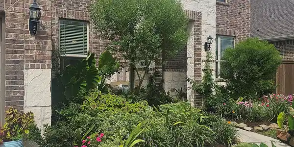 Image 3: Gorgeous and inviting landscaping welcomes you hom