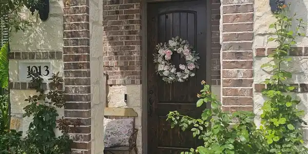 Image 4: Welcome home! Upgraded entry door and upgrades thr