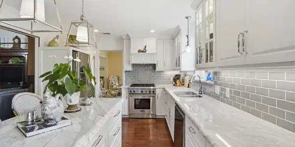 Image 3: Custom pull-out pantry storage to the right of the