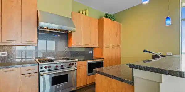 Image 3: Designer appliances and plenty of storage & prep s