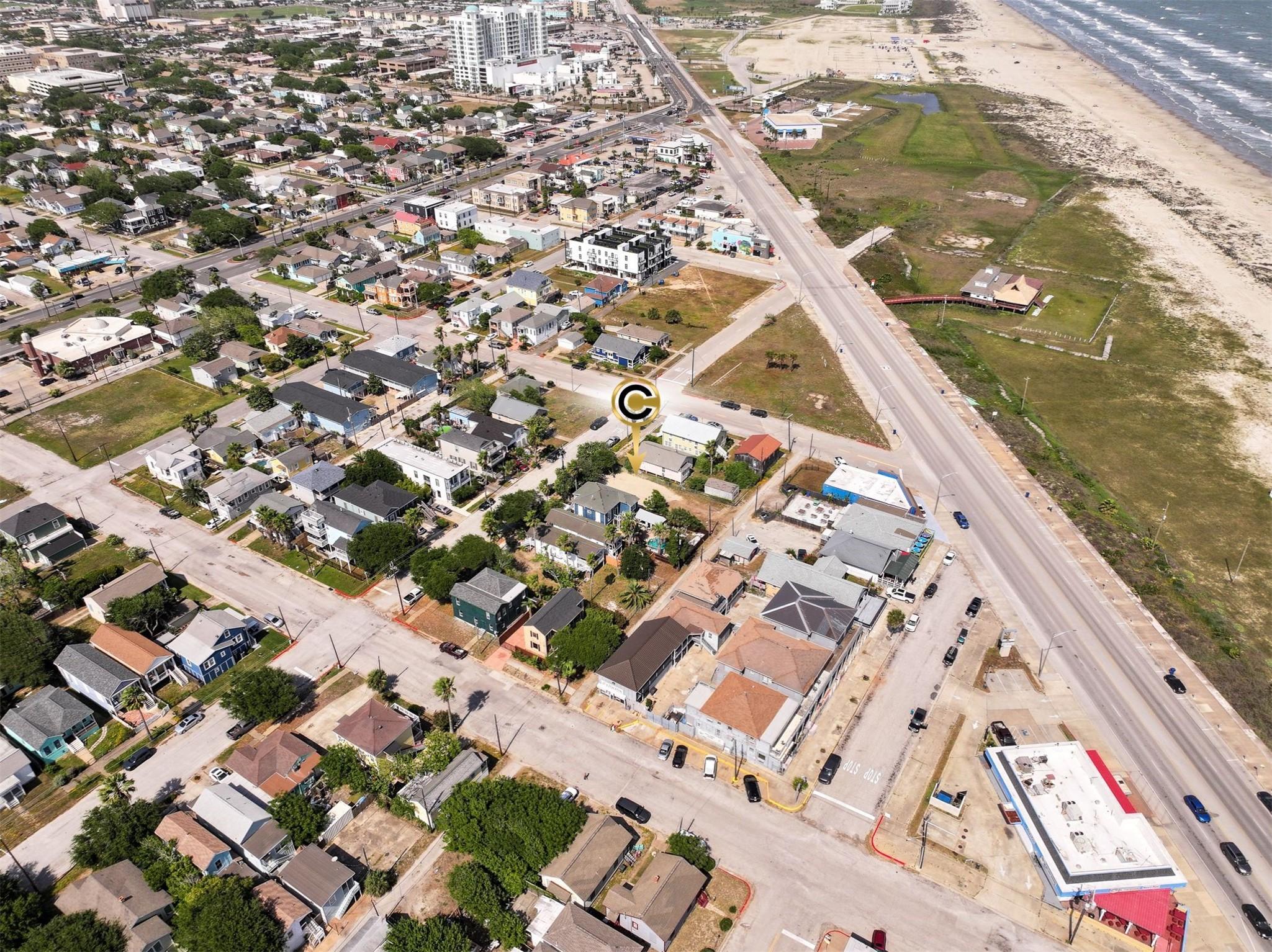 Image 4: From a broader aerial vantage point, the surroundi