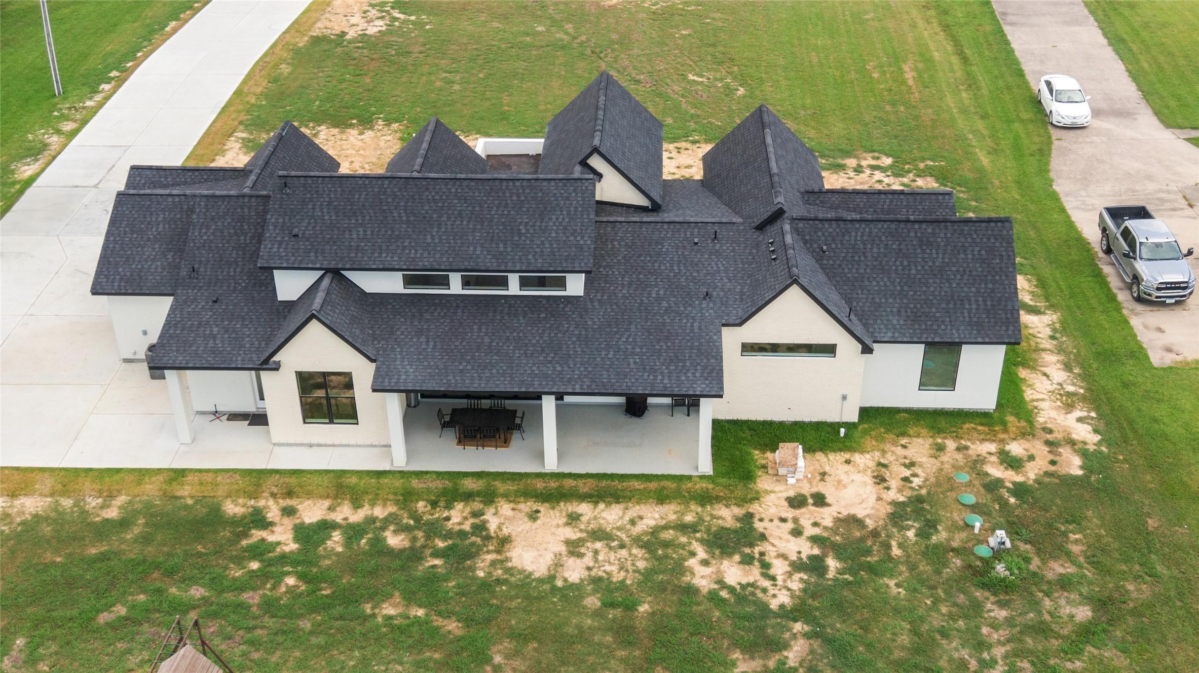 Image 2: Aerial view from the back of the home