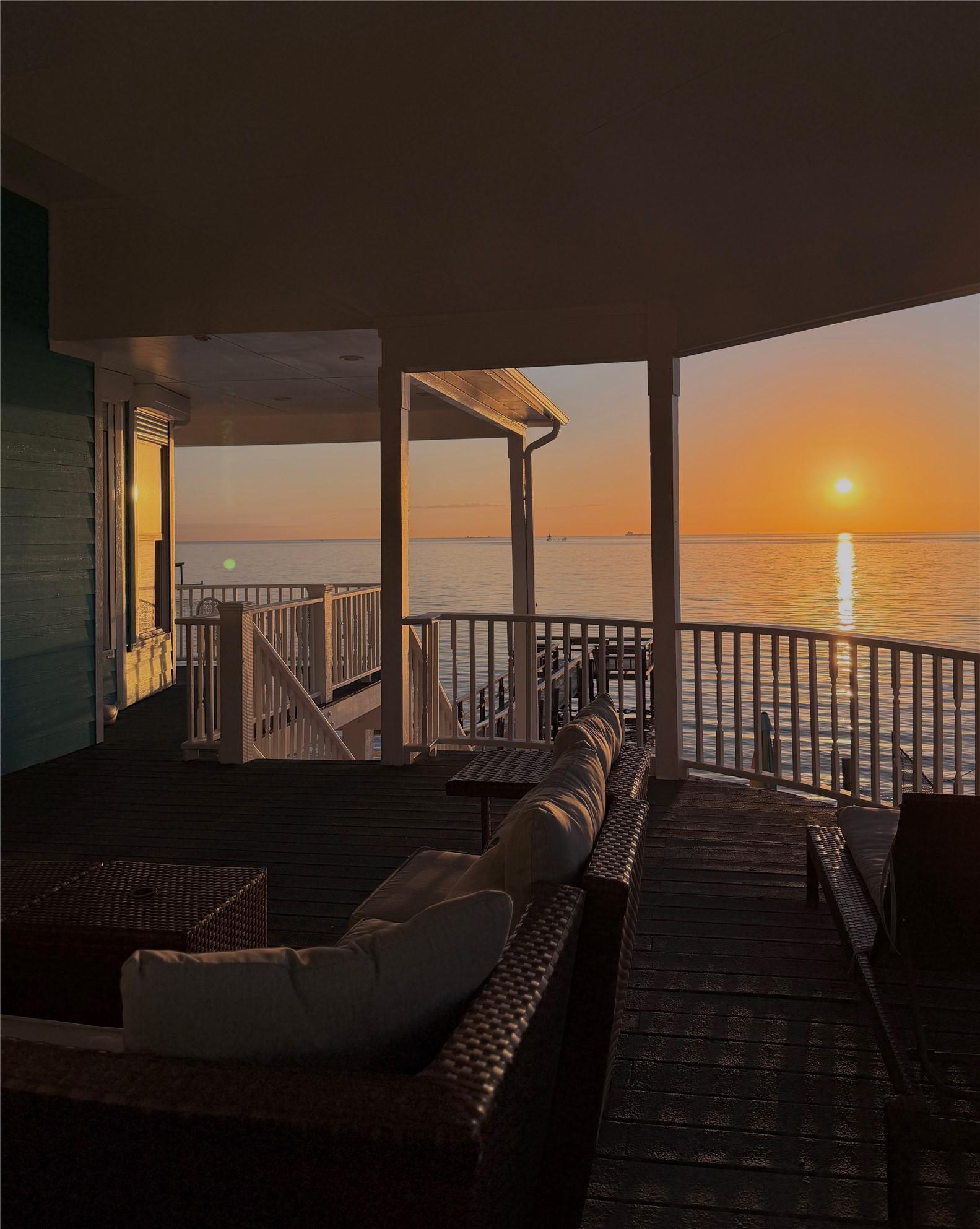 Image 3: View From top patio to the Bay.