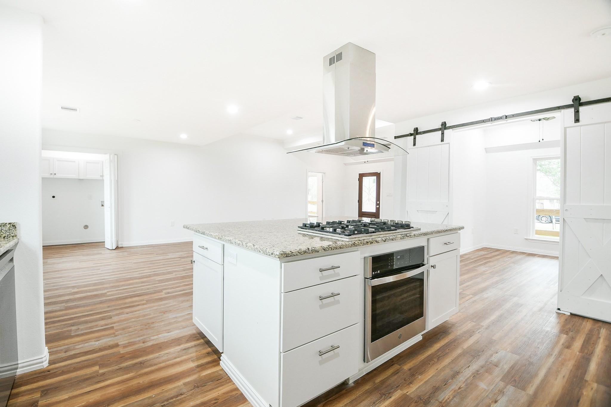 Image 4: Fabulous island kitchen with upgraded appliances.