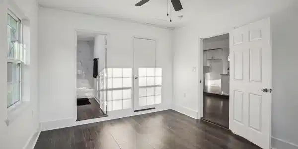 Image 4: View of primary bedroom with natural light