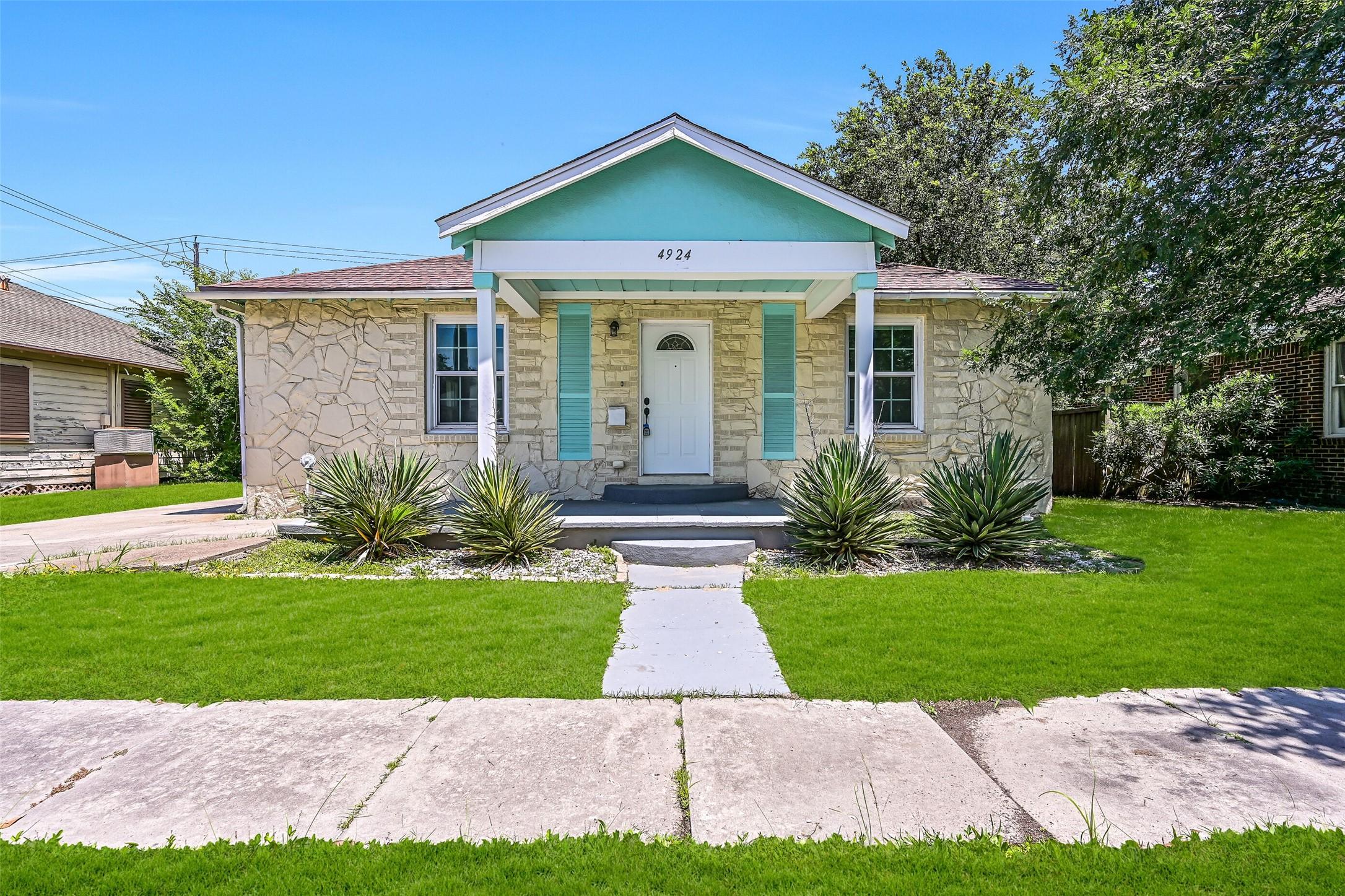 Image 1: Welcome home to 4924 Austin Drive, where charming