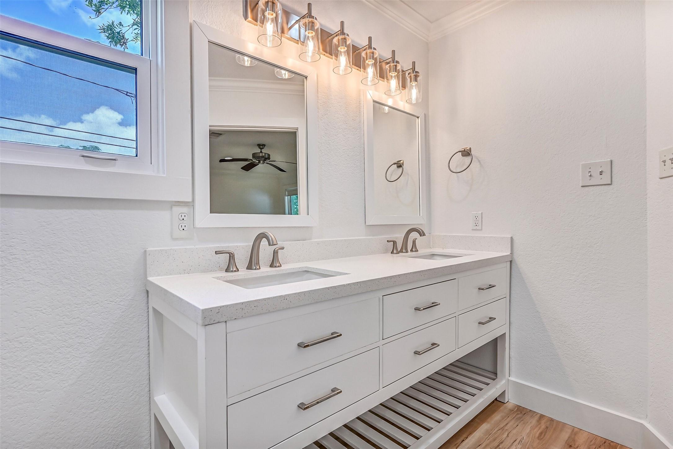 Image 4: Start your mornings in a primary bath that feels f