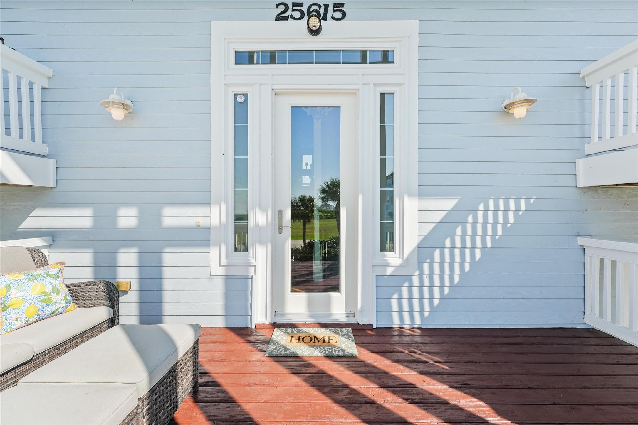 Image 4: The welcoming front porch sets the tone for relaxe