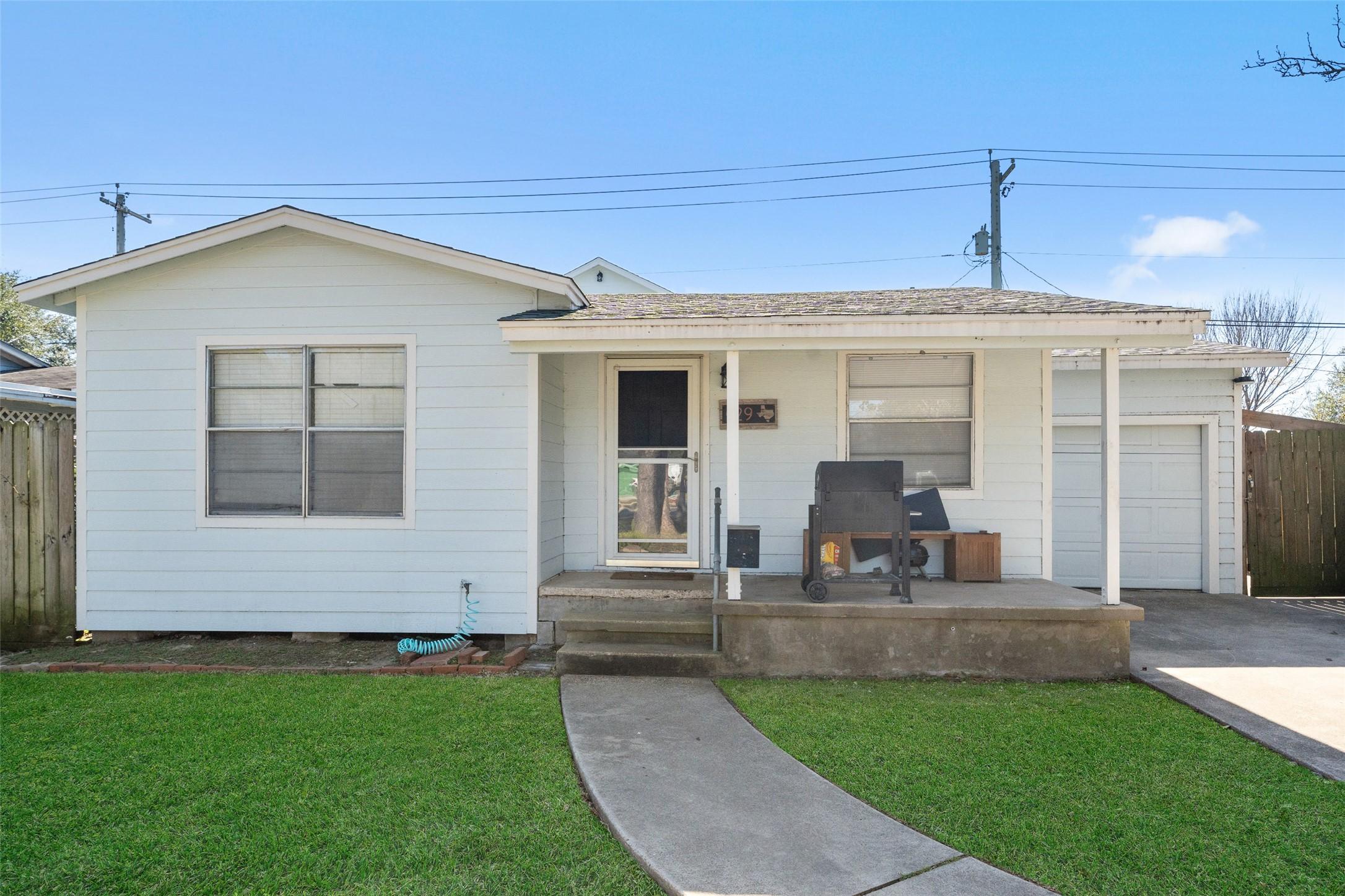 Image 2: Front house has 2 bedrooms, 1 bath. Exterior recen