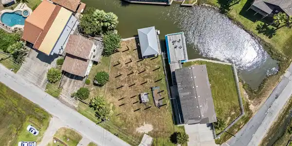 Image 3: Lot with Pilings and Boat Lift
