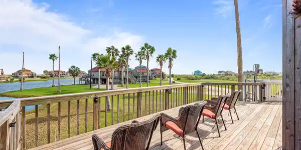 Image 4: Covered patio and two large decks overlooking the