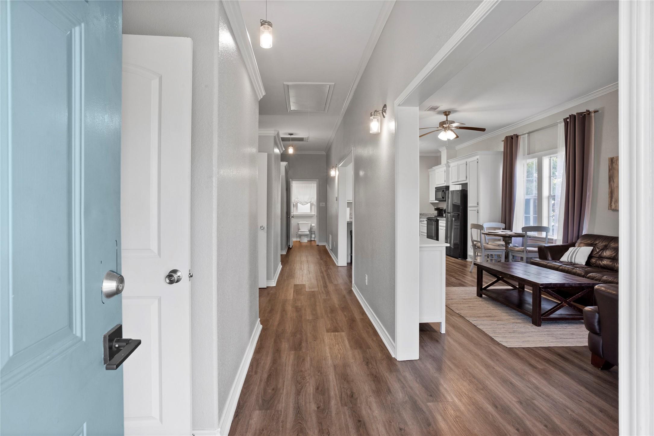 Image 2: The inviting front porch sets the tone, leading in