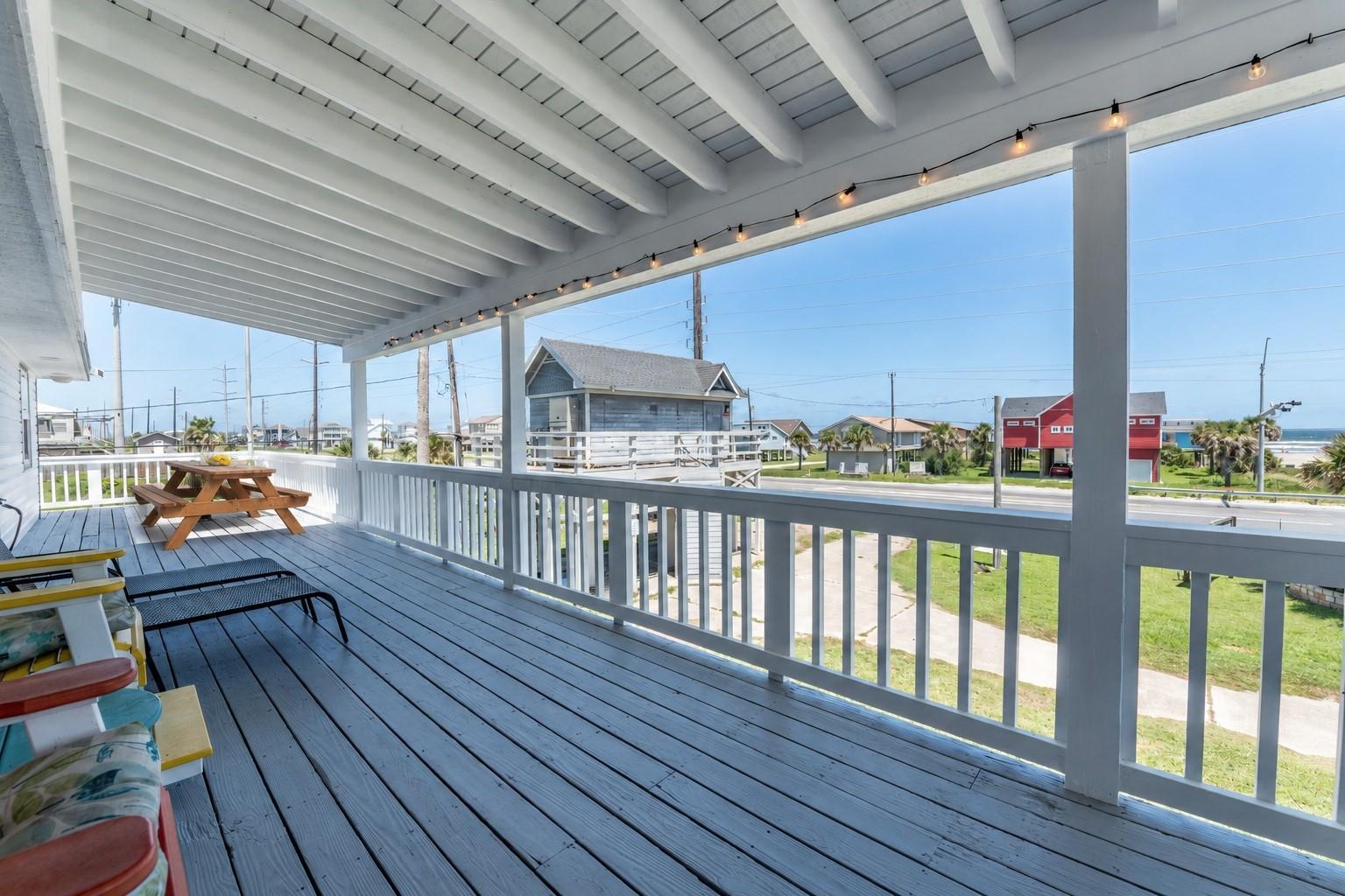 Image 4: Expansive covered deck faces the Gulf, with the be