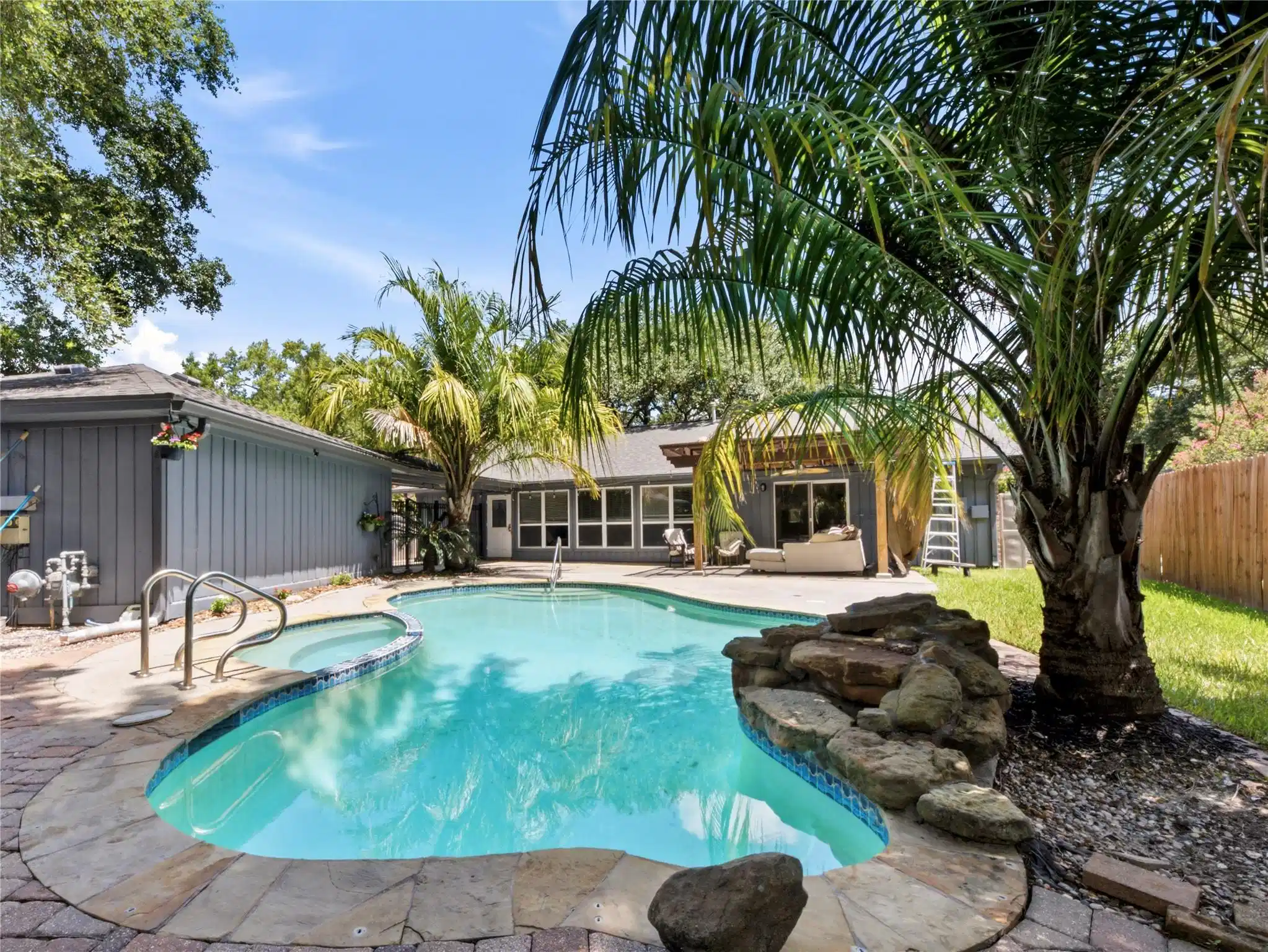 Image 1: Enjoy year-round relaxation in the heated pool and