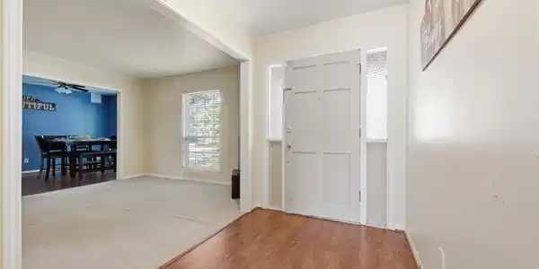 Image 4: Step inside to an inviting foyer that welcomes you