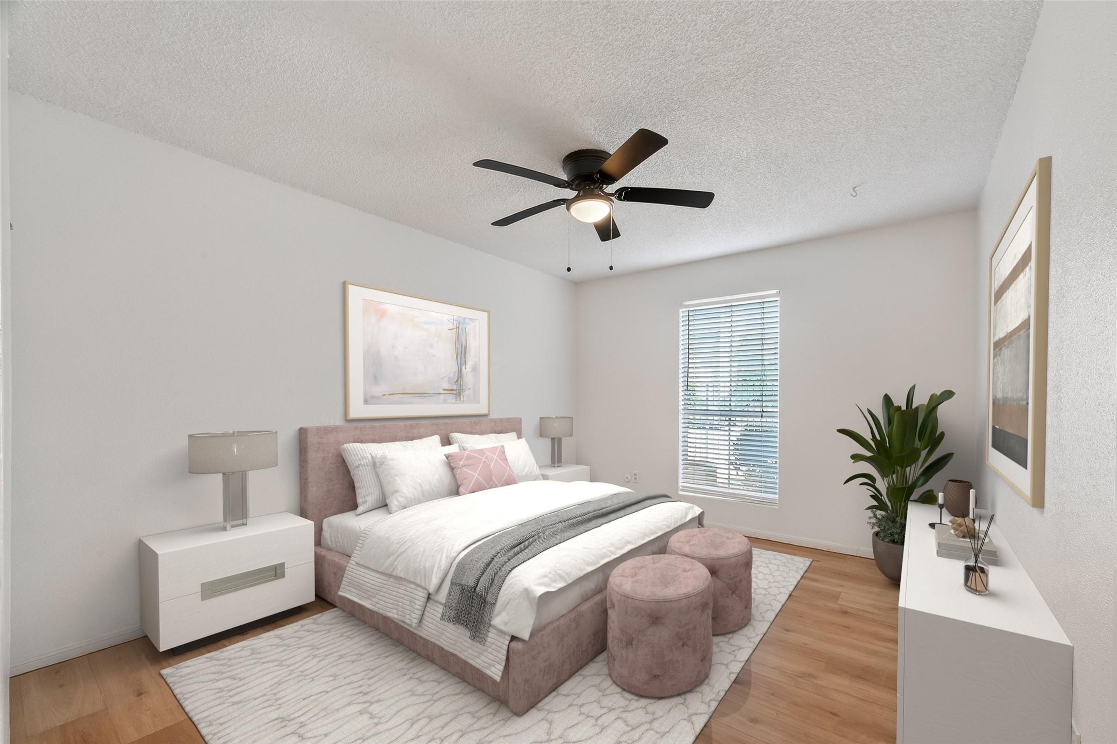 Image 2: The bedroom is spacious and easily holds a queen s