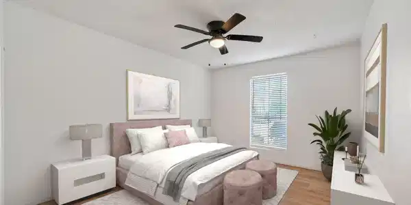 Image 2: The bedroom is spacious and easily holds a queen s