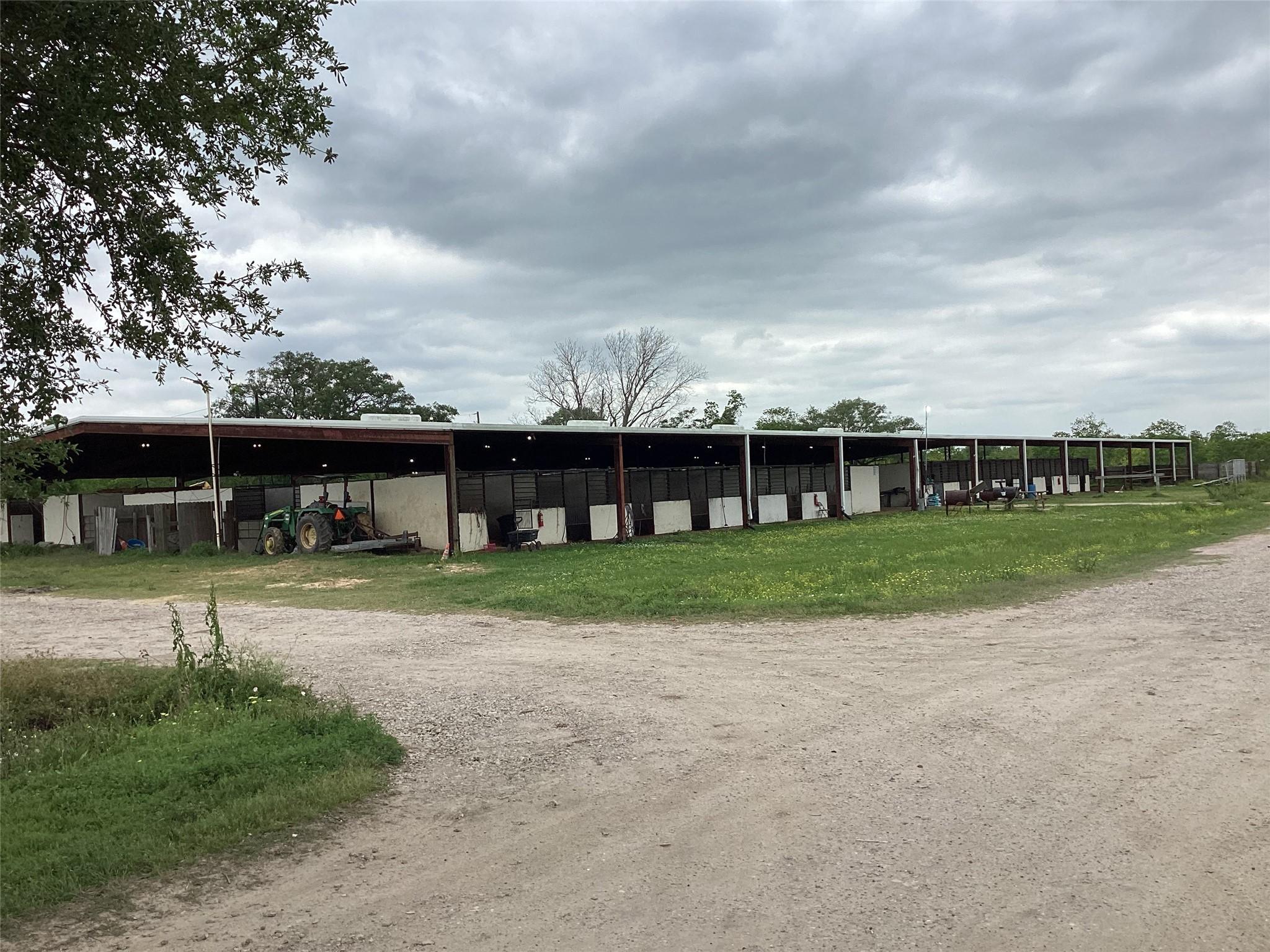 Image 3: Stables with lighted covered arena at the back