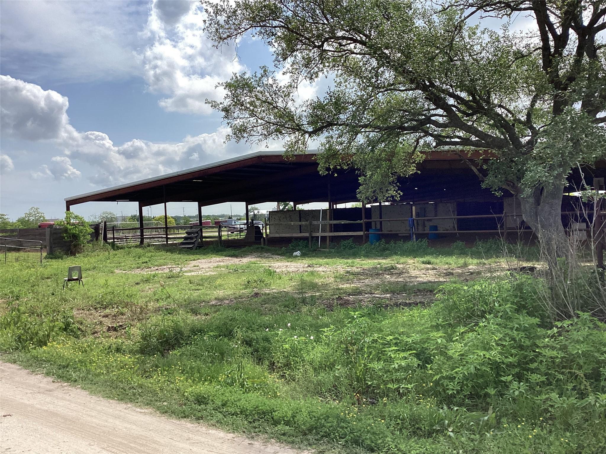 Image 4: Stables with lighted covered arena at the back