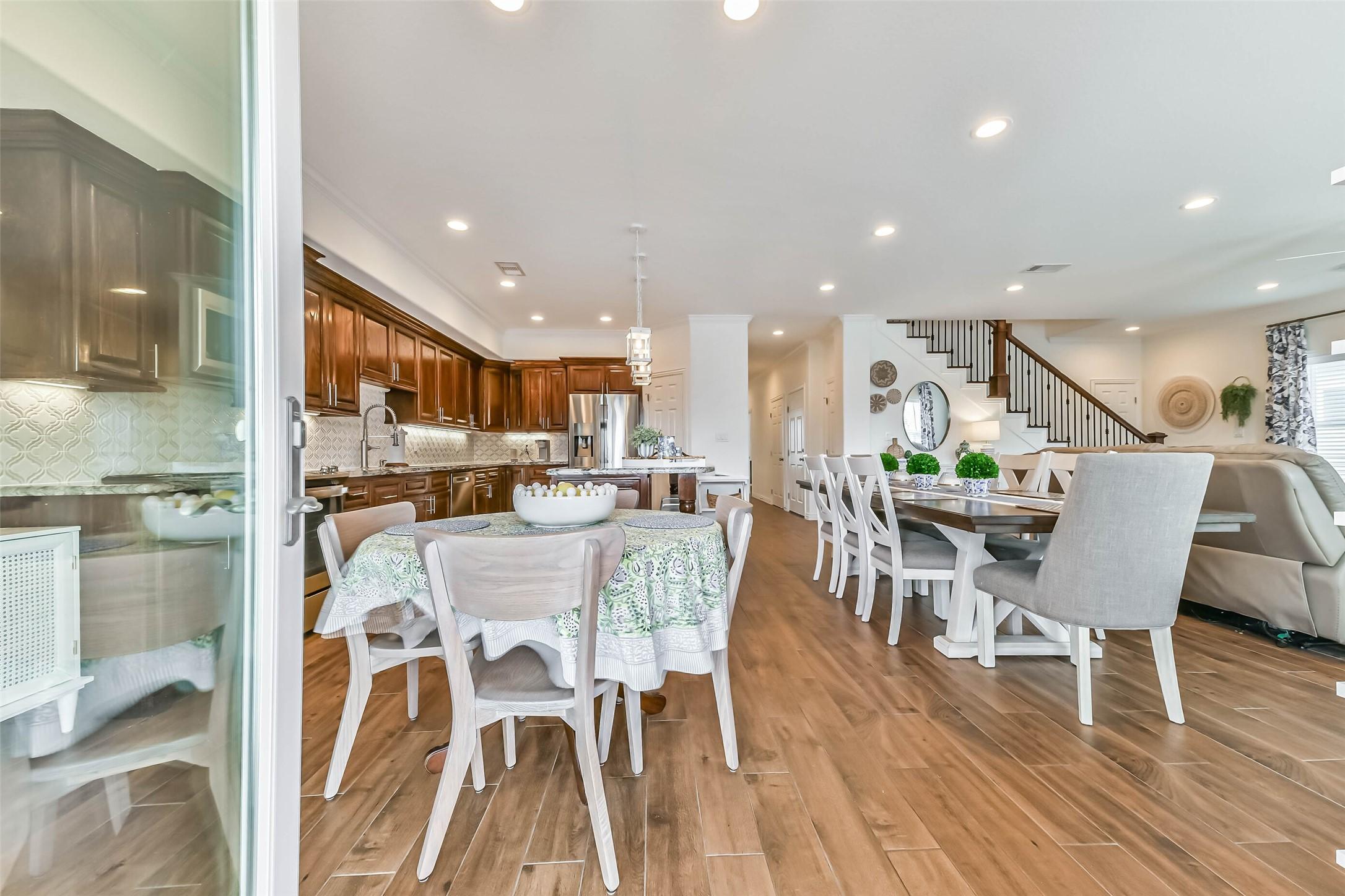Image 4: A welcoming entry that opens into bright living sp