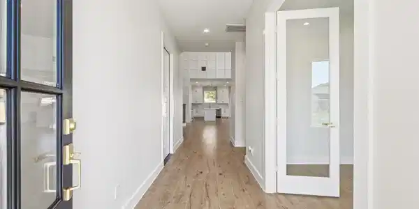 Image 2: Step inside through the 8-foot front door into a s
