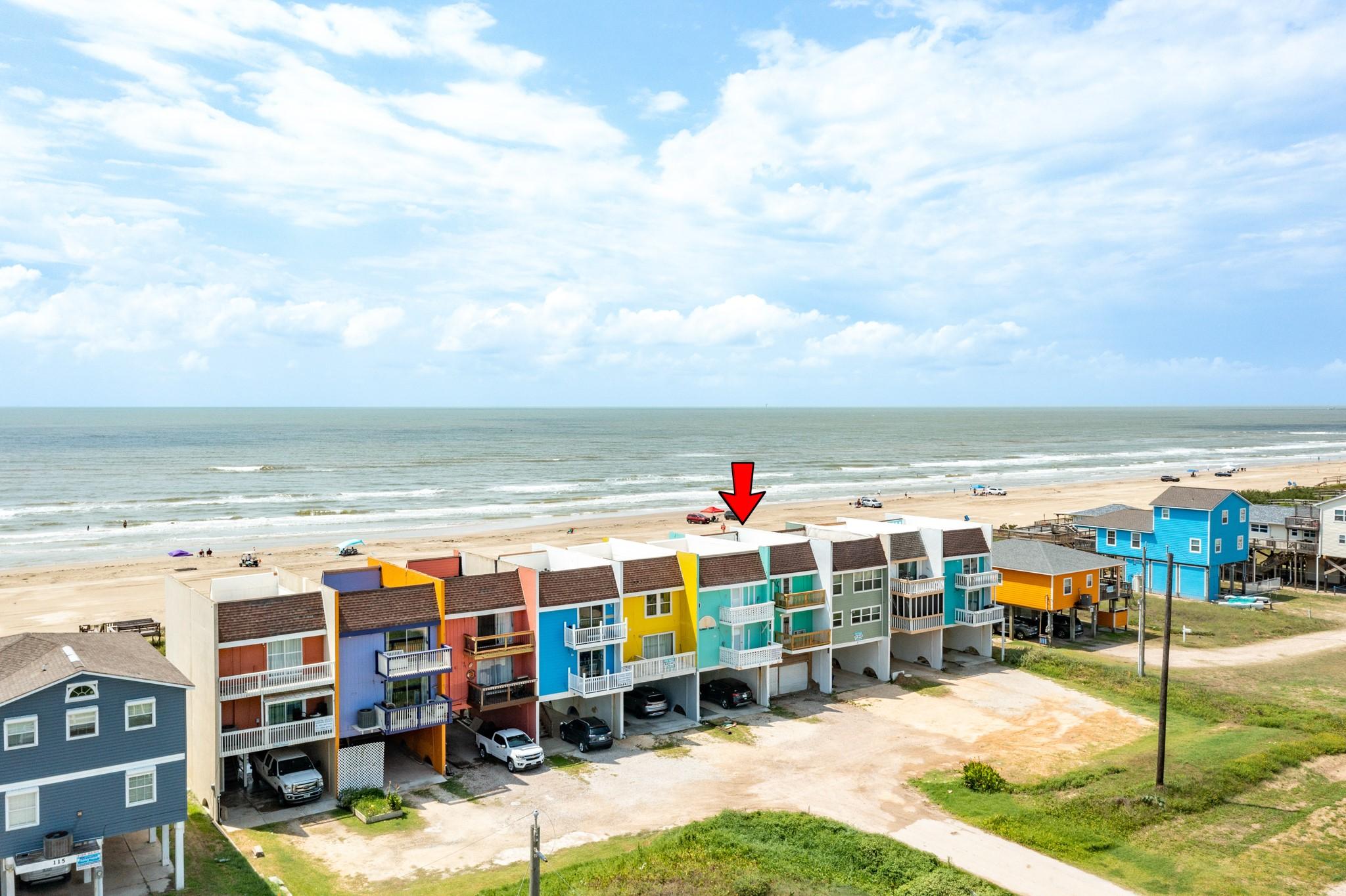 Image 2: Prime beachfront property with vibrant, colorful h