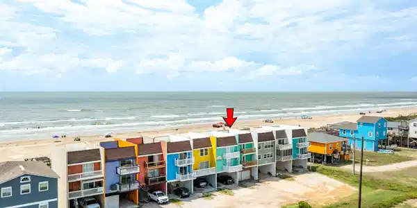 Image 2: Prime beachfront property with vibrant, colorful h