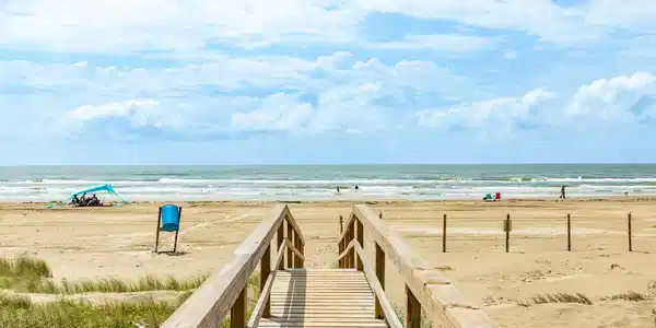 Image 4: Direct beach access via a convenient walk-over bri