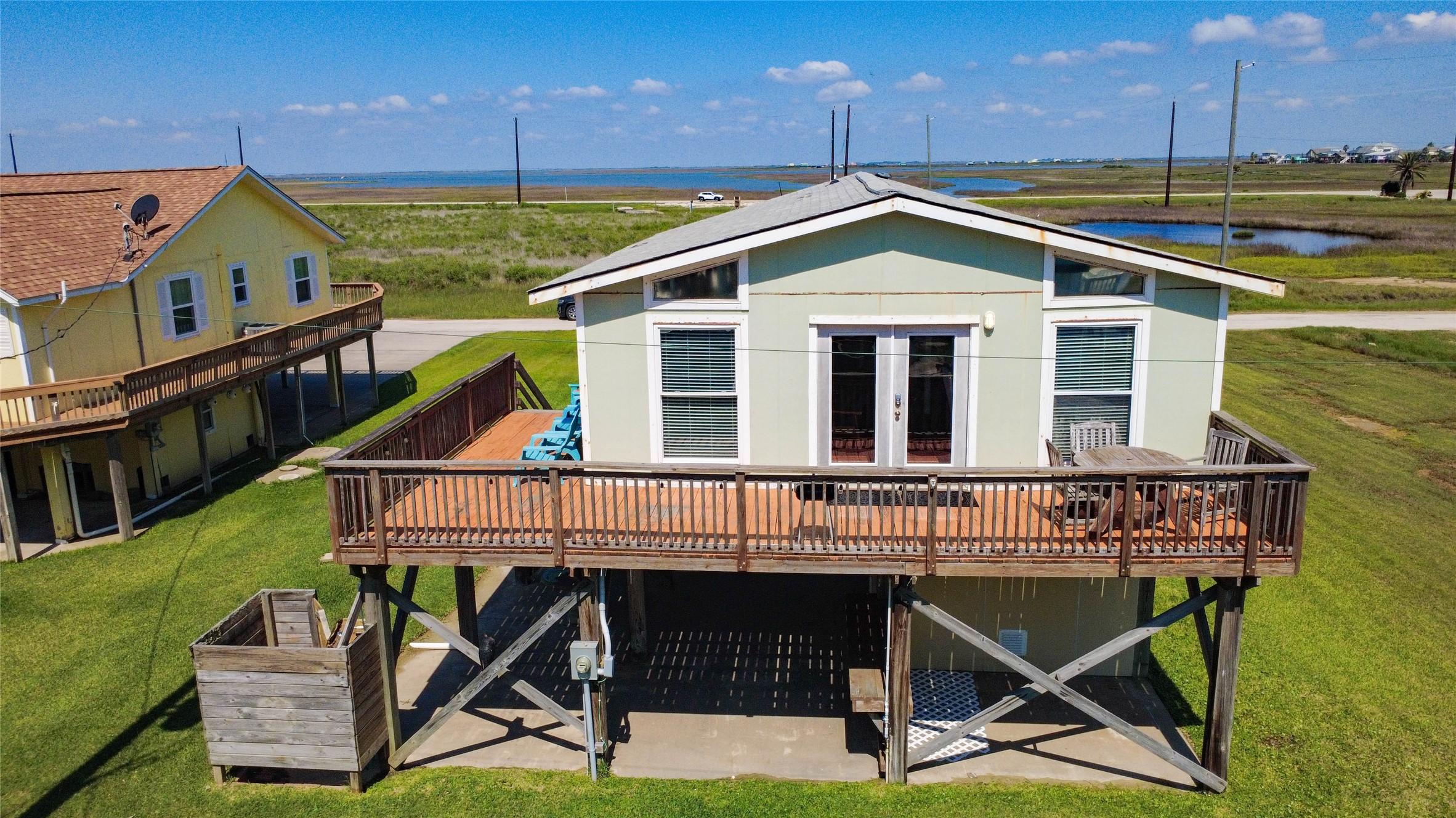Image 2: The wrap-around deck provides the perfect perch to