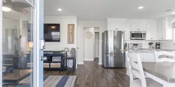 Image 2: Step inside to an open-concept floor plan filled w