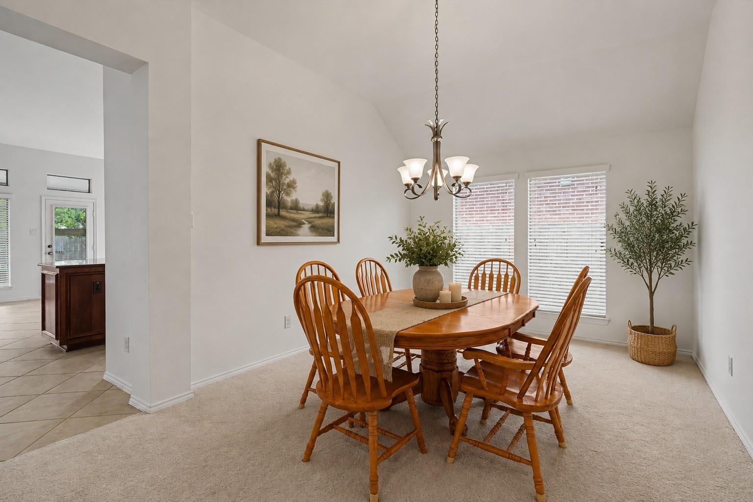 Image 2: This home offers 4 bedrooms, a formal dining room,