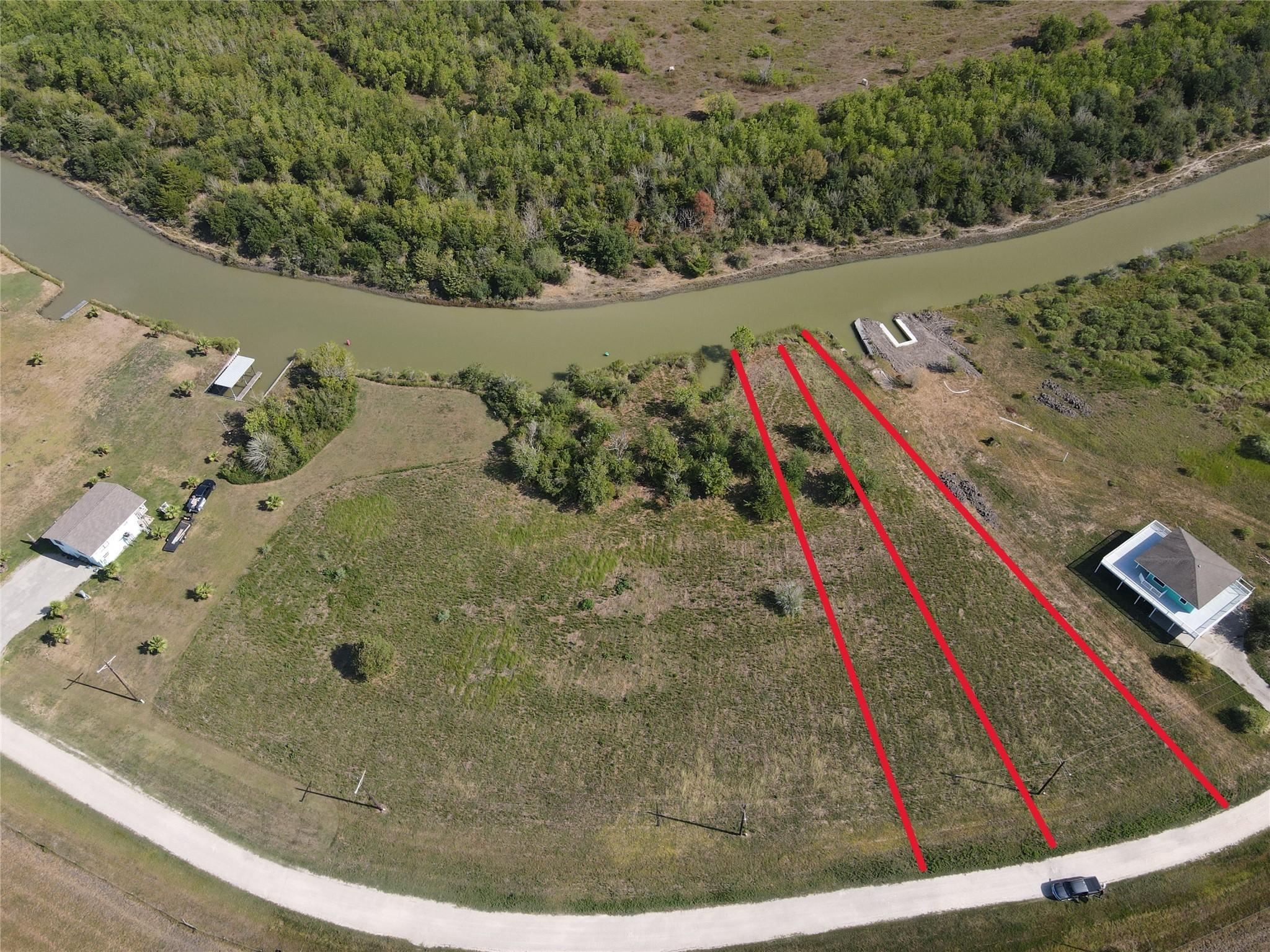 Image 1: 2 Canal Front lots - red lines are approximate