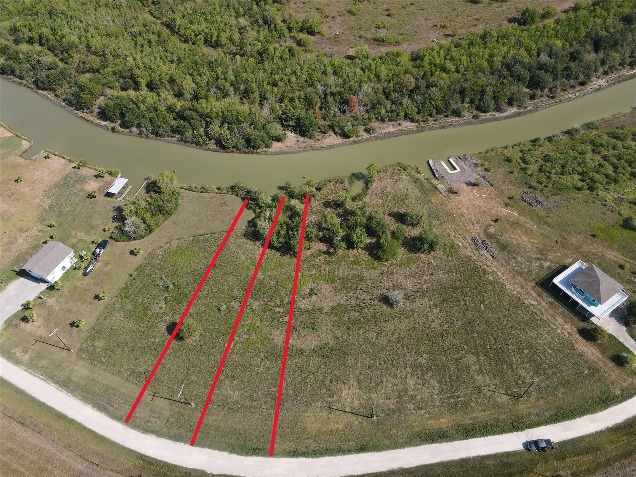 Image 1: Lots 58 & 59 are canal front - red lines approxima