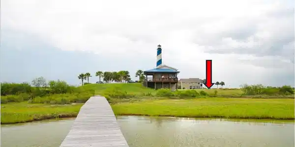 Image 3: Bay front lot view from public fishing dock