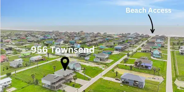 Image 3: This aerial photo showcases a coastal neighborhood
