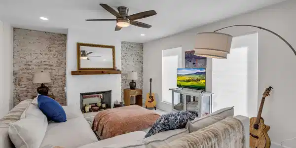 Image 3: The living room offers a comfortable space for gat