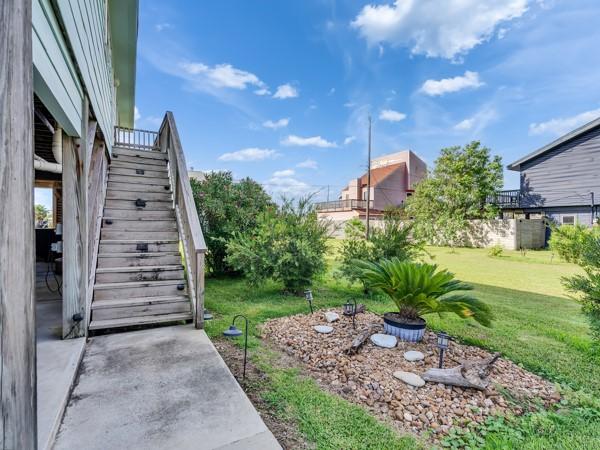 Image 4: Beautiful landscaping surrounding house