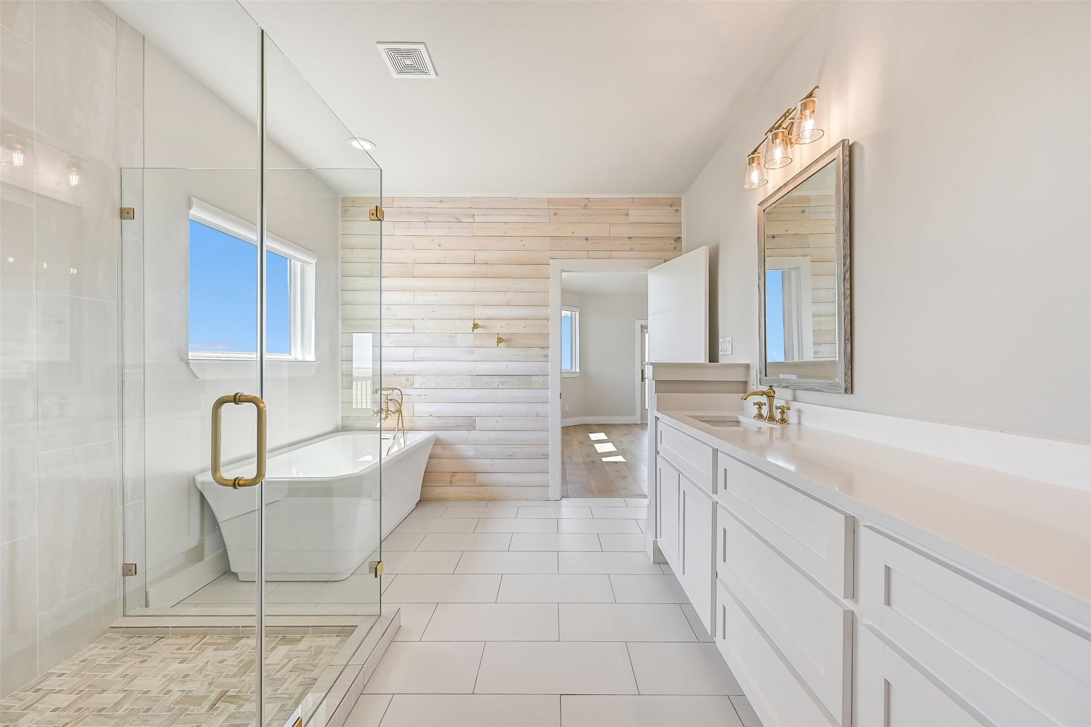 Image 4: Step into the primary ensuite bath, a true spa-lik