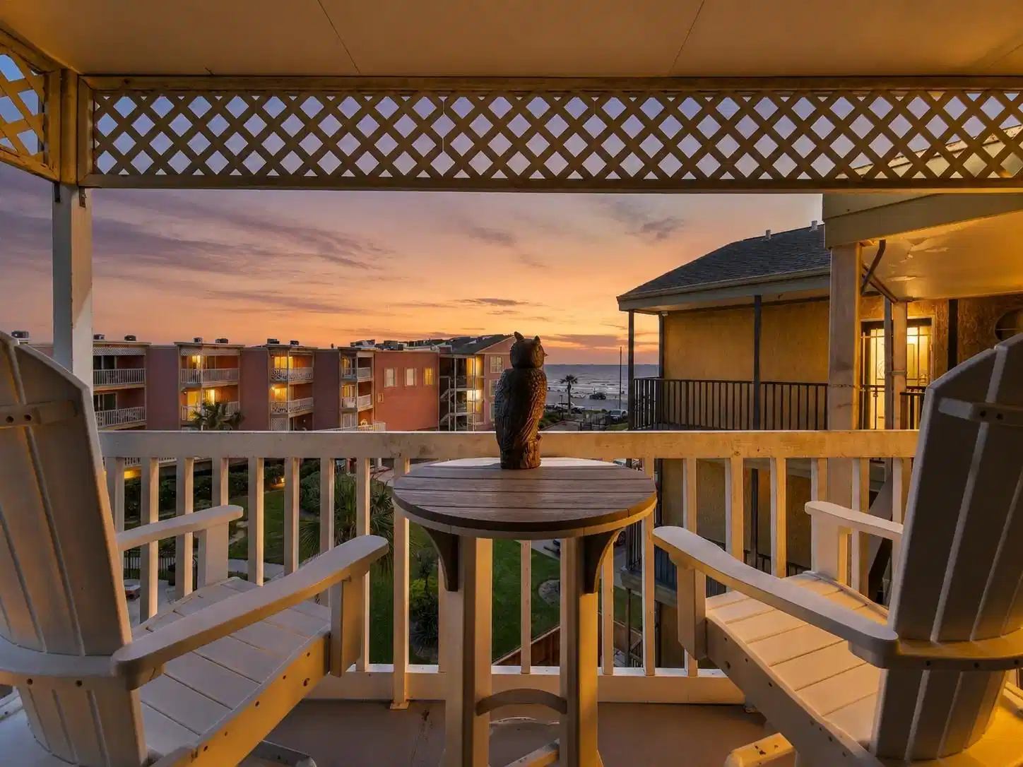 Image 1: Enjoy a private balcony with pool courtyard views,