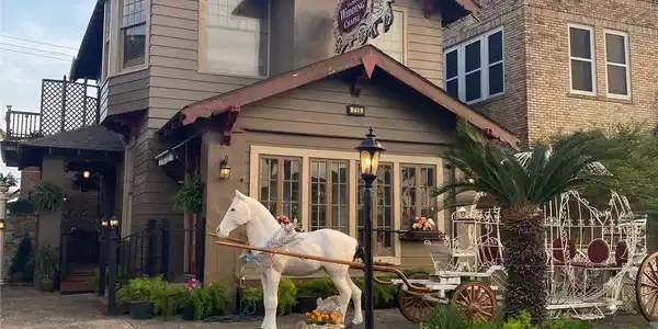Image 4: Horse drawn Wedding Carriage in front is eye catch