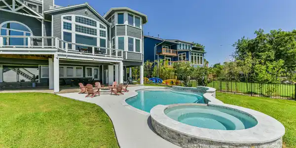 Image 4: Luxurious home with expansive windows and a stunni