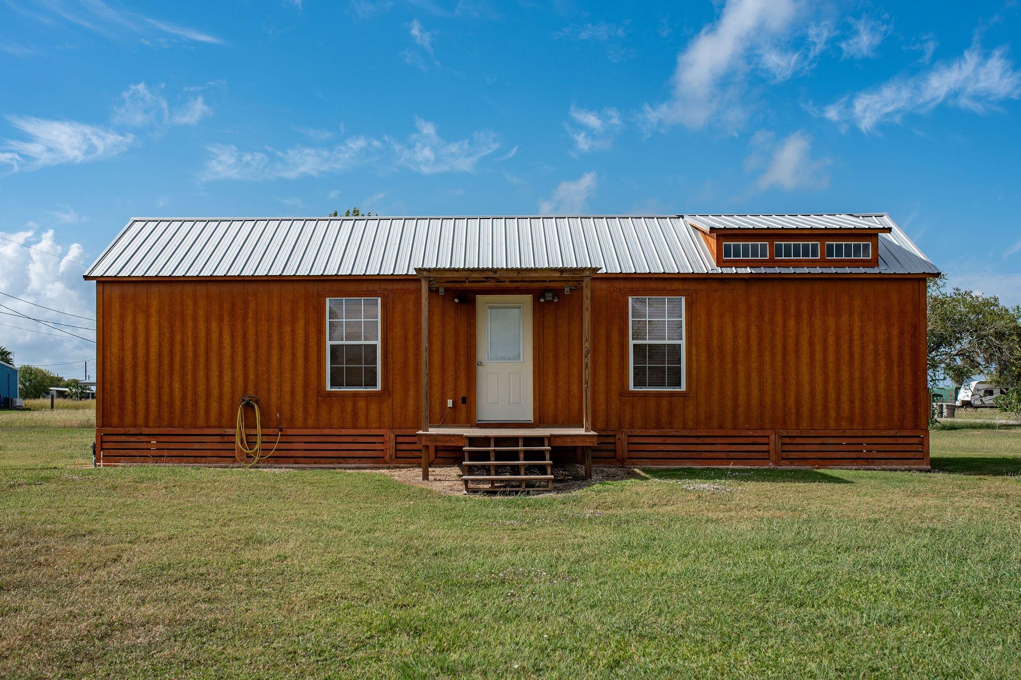 Image 3: Front View of the House with Covered Front Porch