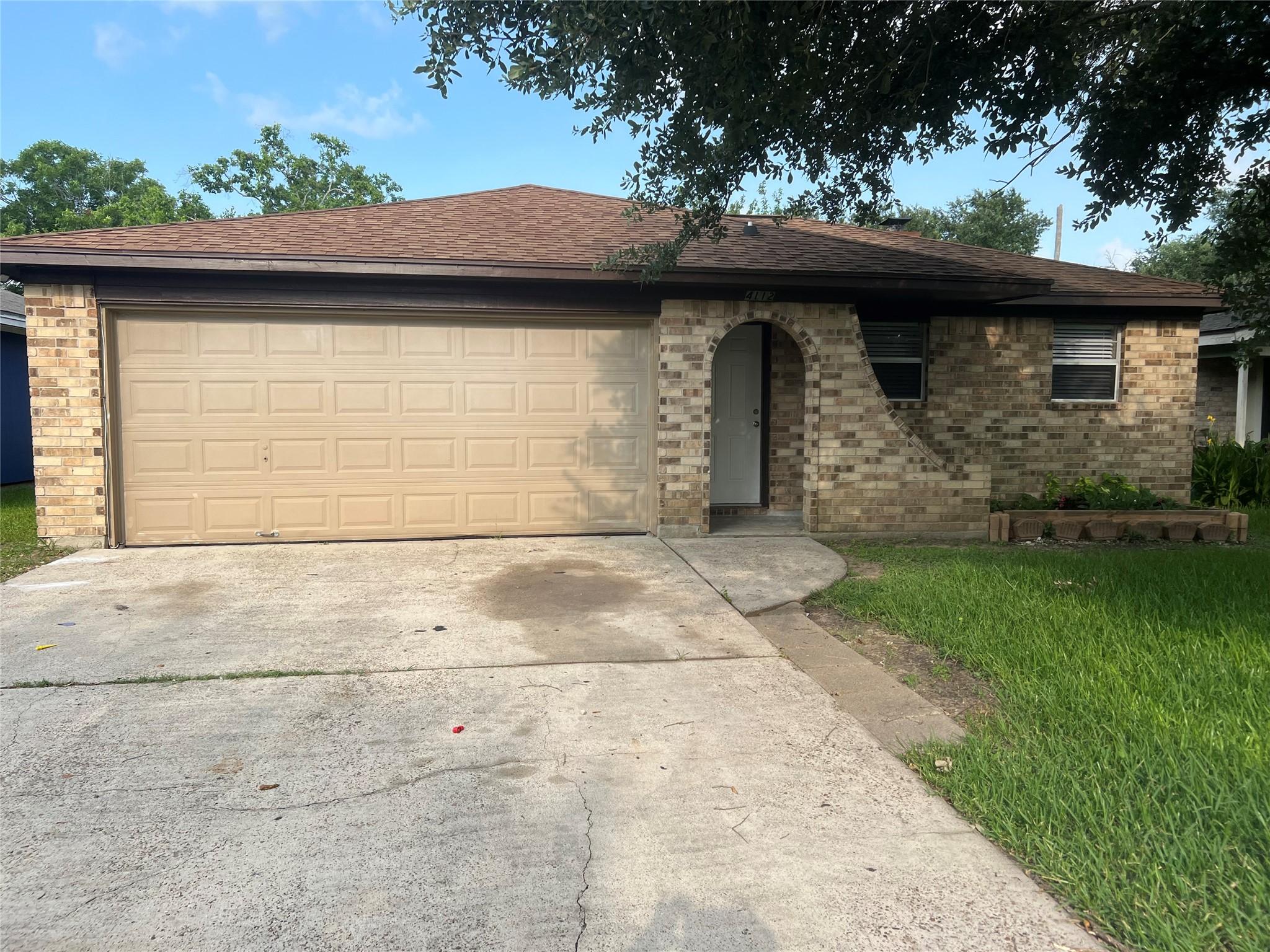 Image 1: Front exterior view of home