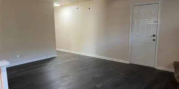 Image 3: Living room with new waterproof vinyl tile floorin
