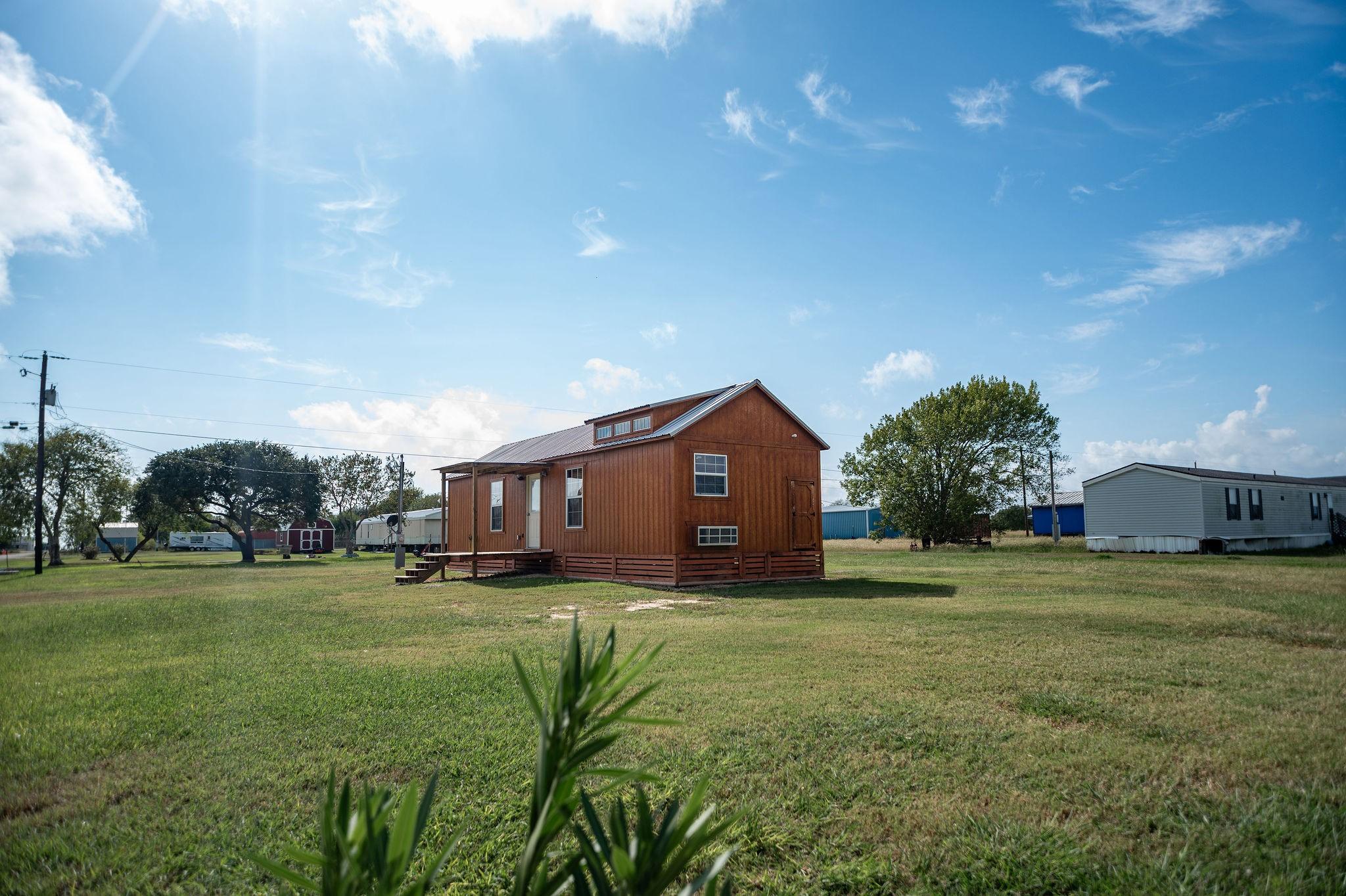 Image 4: View of the Front of the House and Front Yard from
