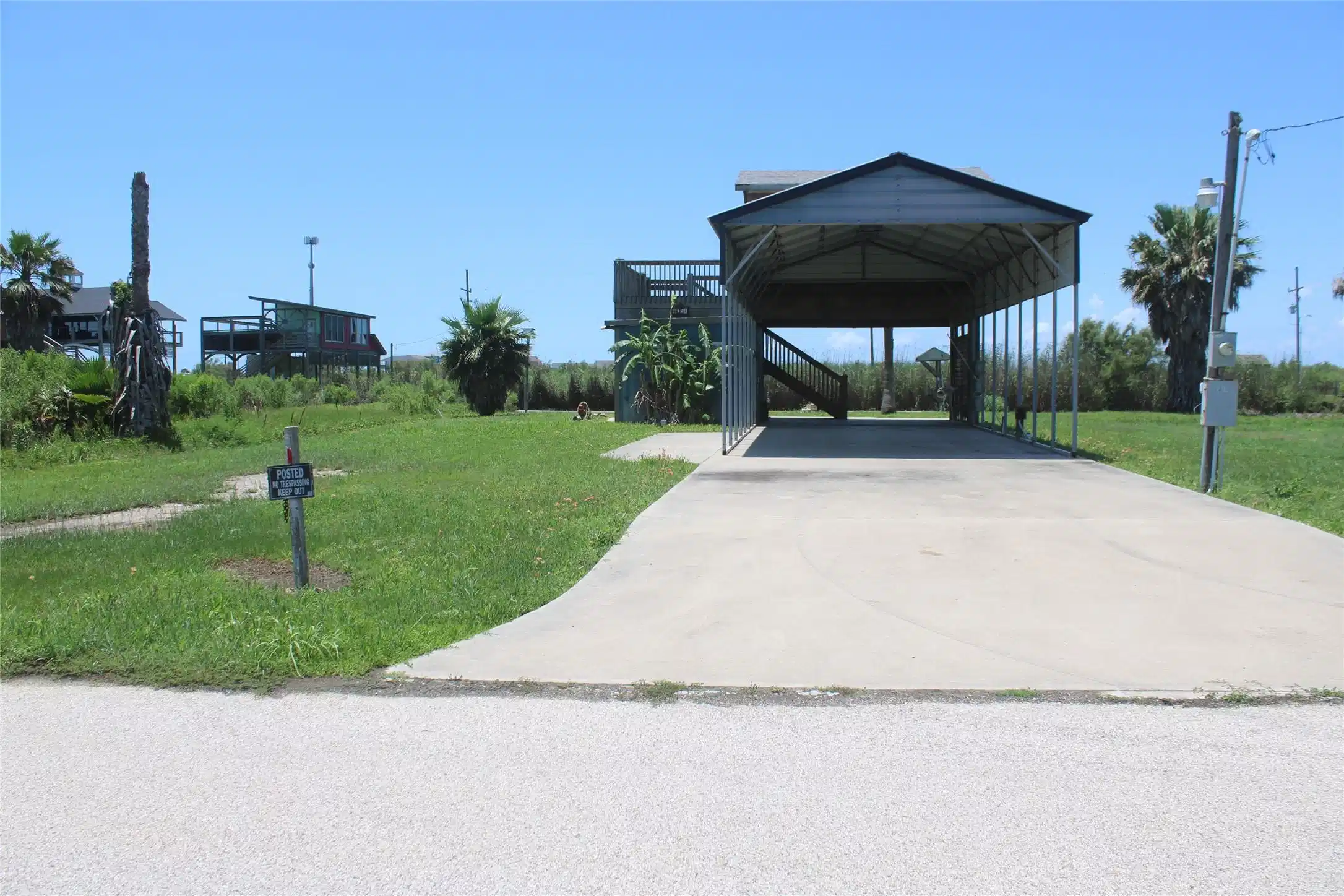 Image 1: RV cover with screened in sundeck and extra lot!