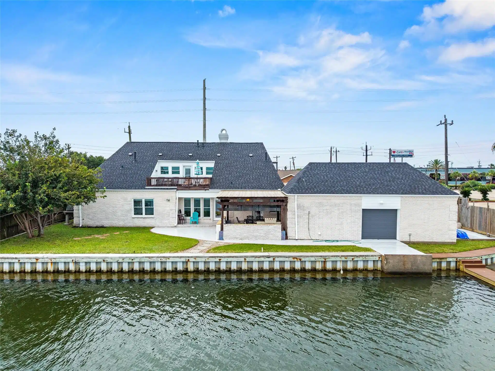 Image 1: The house has 113 feet of vinyl bulkhead.