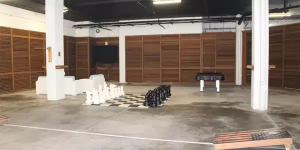 Image 2: Covered "fun space" @ ground level. Pool table, co