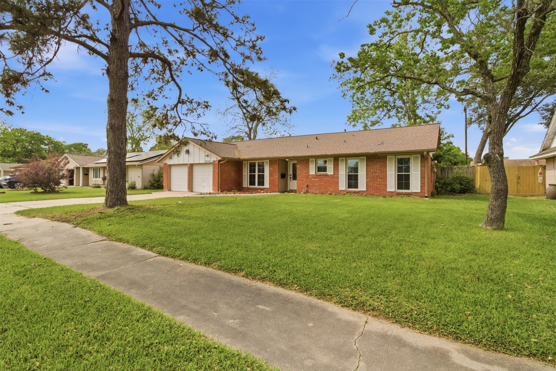 Image 1: Welcome to 7824 Yucca Dr! Classic curb appeal pair